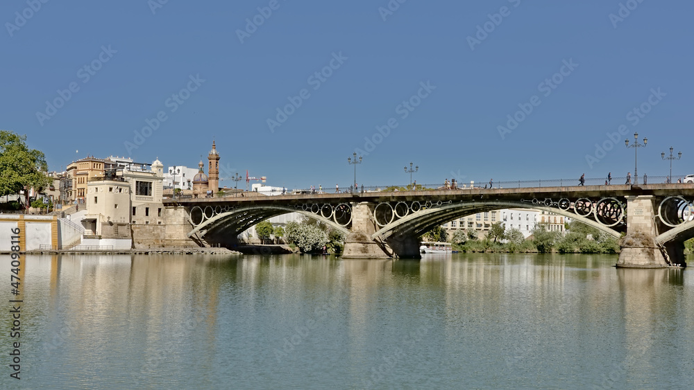 Triana bridge over Guadalquivir river in Seville, Spain