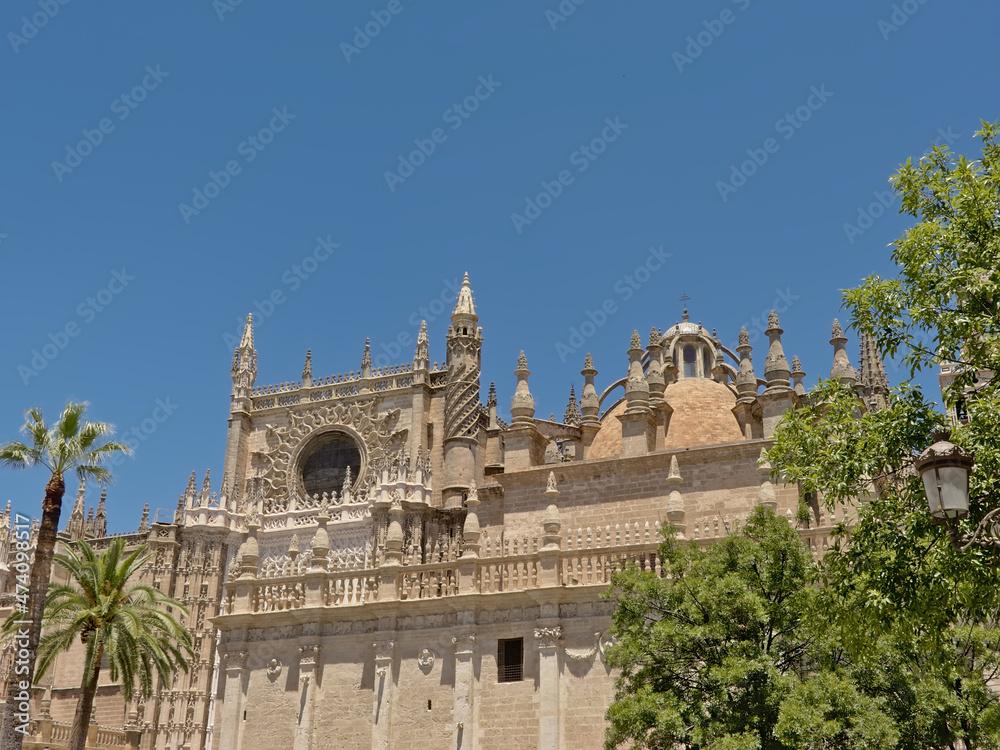 Detail of the Catedral de Santa Maria de la Sede or Cathedral of Saint Mary of the See in ornate gothic style in Seville, Spain 
