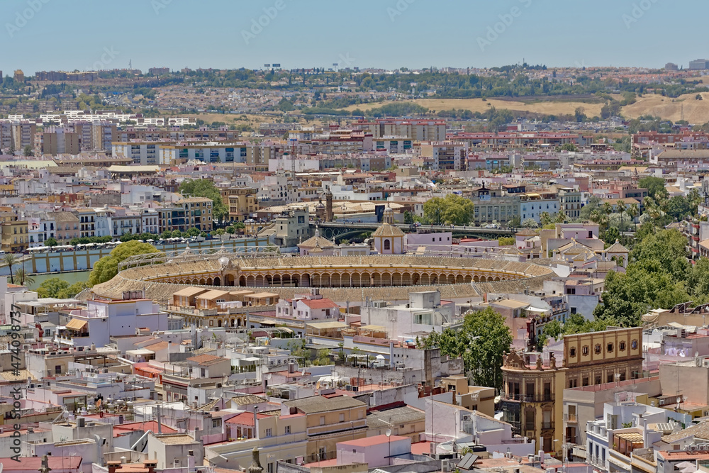 Aerial view on a r the center of the city of Seville , Spain, with the Plaza de toros de la Real Maestranza de Caballería , bullfighting ring