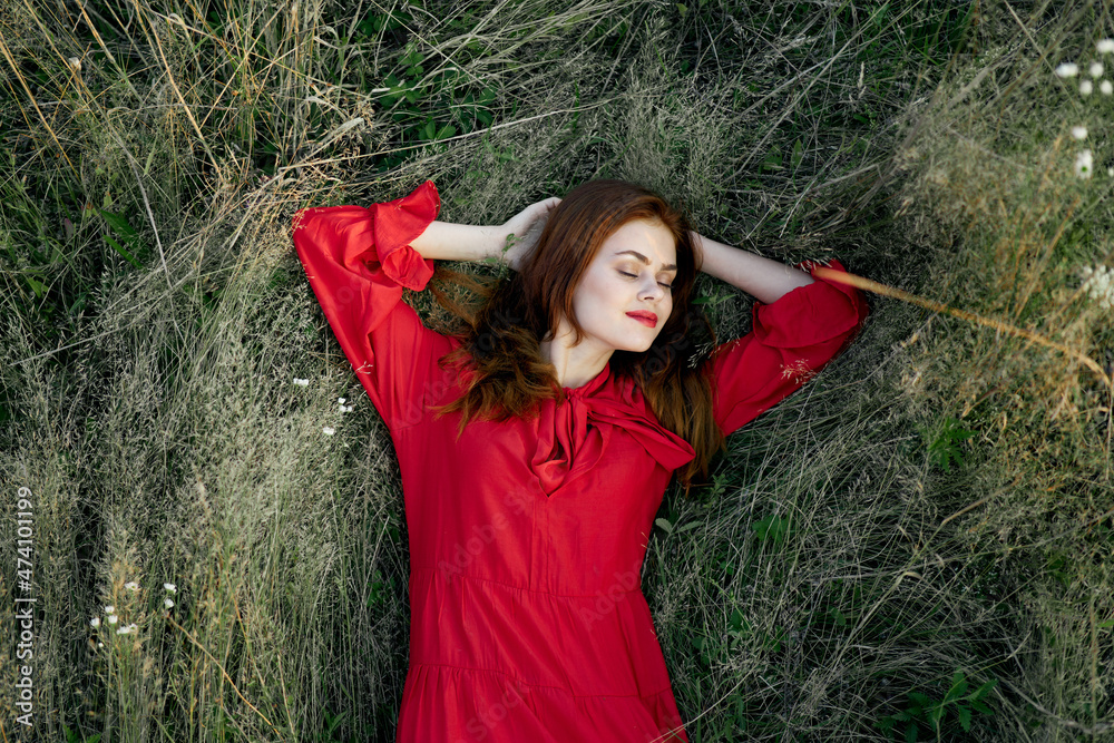 woman in red dress nature green grass landscape rest woman in red dress nature green grass landscape rest