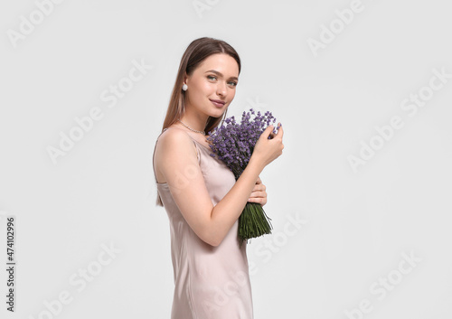 Beautiful young woman with ...