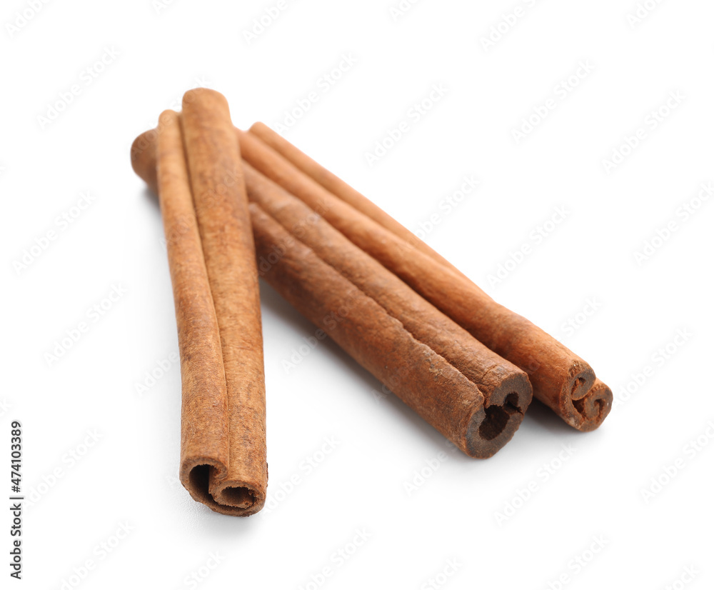 Natural cinnamon sticks on white background Natural cinnamon sticks on white background