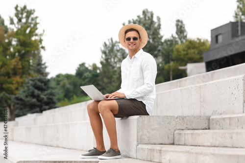 Handsome young man in sungl...