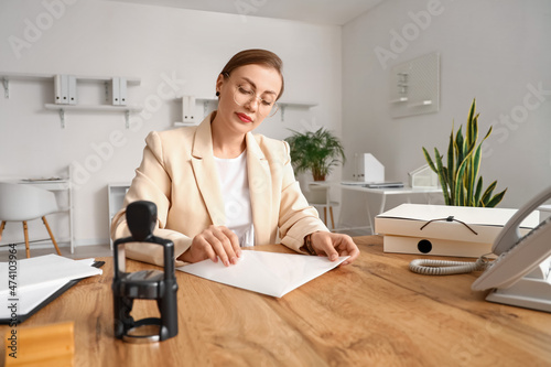 Female notary public workin...
