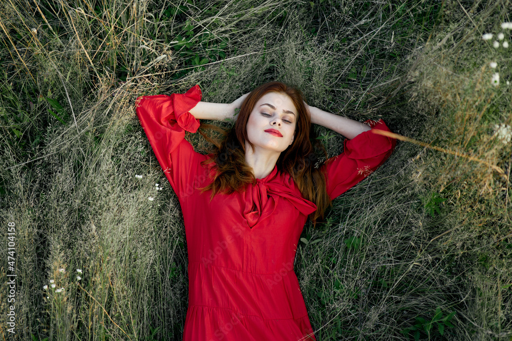 woman in red dress nature green grass landscape rest woman in red dress nature green grass landscape rest