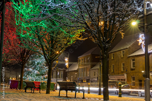 Very Christmassy photo at night of Mansfield Woodhouse High Street in Nottinghamshire - stock photo.jpg