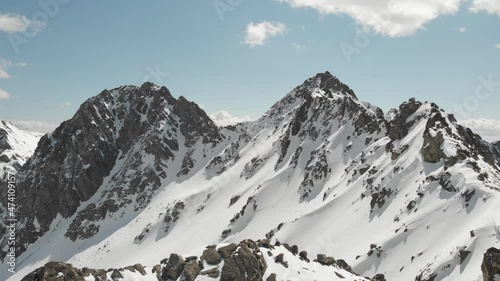 Flying deep in the mountains in the winter 