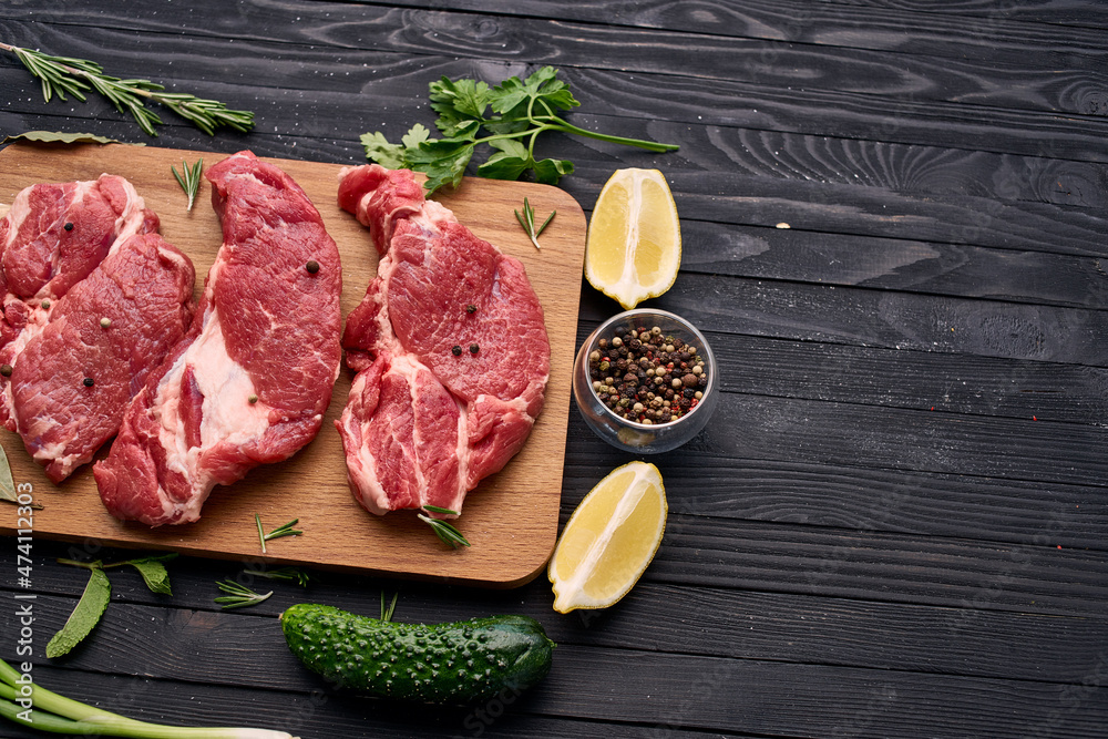 meat vegetables ingredients on a wooden board beef meat vegetables ingredients on a wooden board beef