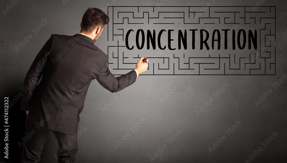 businessman drawing maze concept businessman drawing maze concept