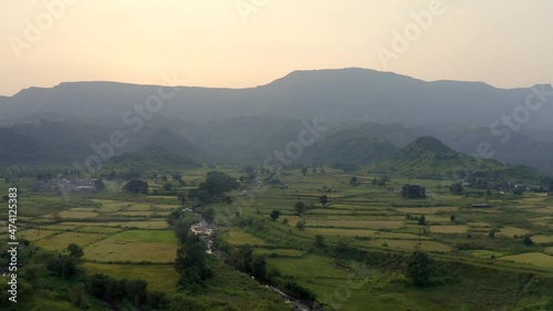 Green Agricultural Fields Of Karjat Town In Maharashta India - aerial shot photo