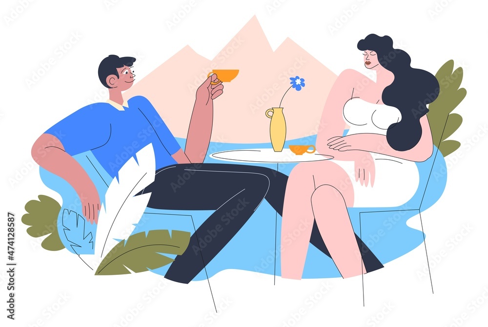 Obraz premium Couple in restaurant drinking wine and talking