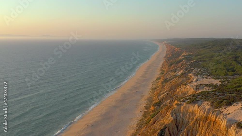 Aerial panorama view of Arriba Fossil da Praia da Gale Fontainhas beach Portugal, seaside rock formations canyon erosion photo