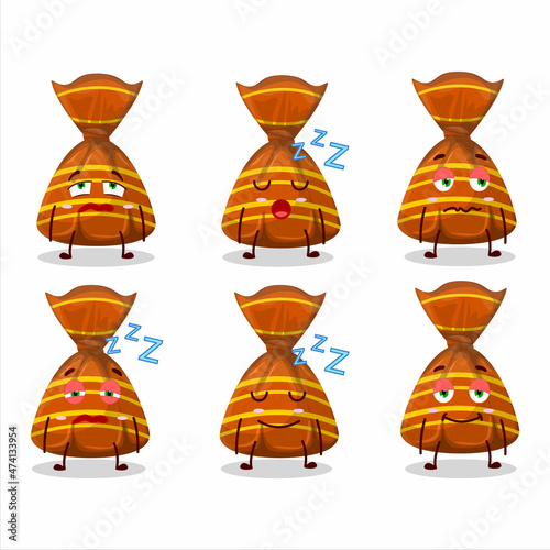 Cartoon character of orange candy wrappers with sleepy expression