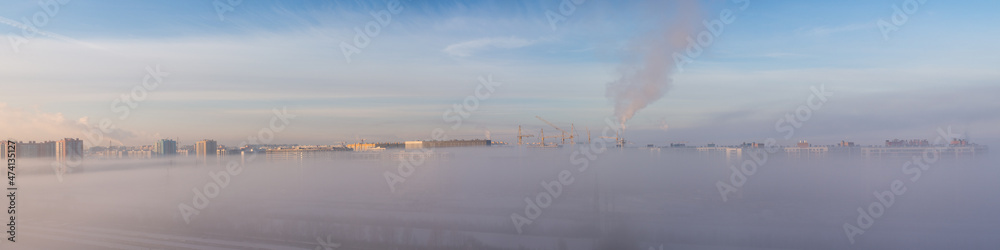 city and dense winter fog