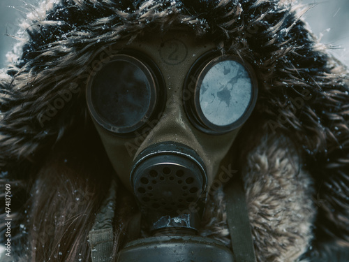 person in gas mask outdoor