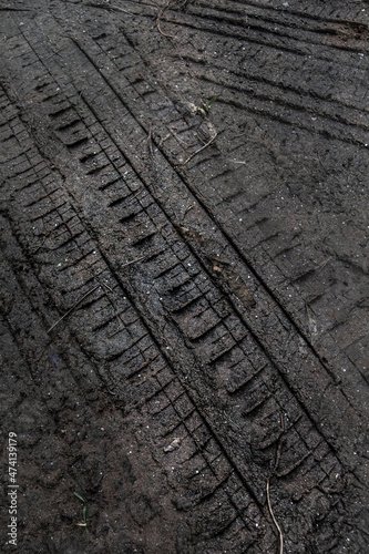 Tyre track on dirt sand or mud, retro tone, grunge tone, drive on sand, off road track