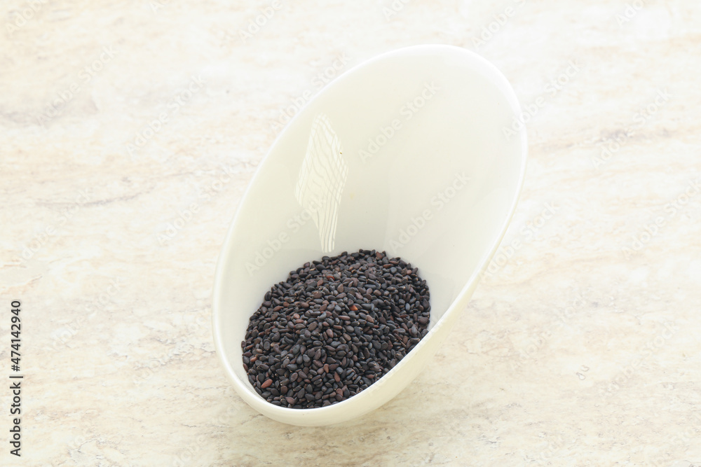 Black sesame seeds in the bowl Black sesame seeds in the bowl