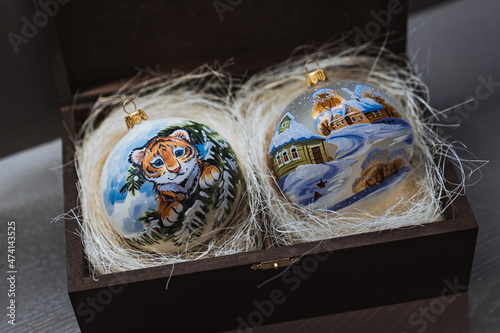 Colorful balls with tiger  Close-up Christmas decorations. Merry Christmas and Happy New Year 2022 