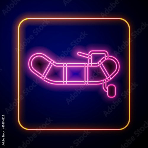 Glowing neon Inflatable boat with outboard motor icon isolated on black background. Vector