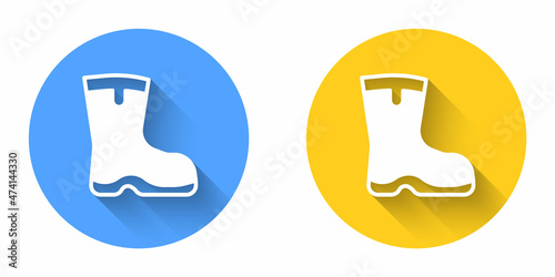 White Fishing boots icon isolated with long shadow background. Waterproof rubber boot. Gumboots for rainy weather, fishing, hunter, gardening. Circle button. Vector