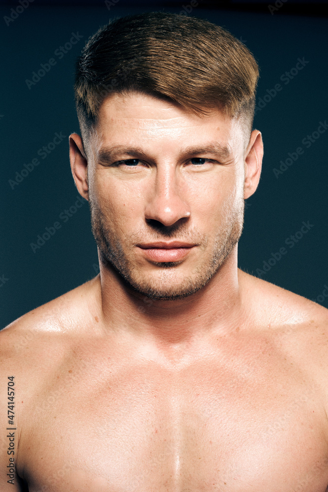 athletic male topless workout muscle bodybuilder dark background athletic male topless workout muscle bodybuilder dark background