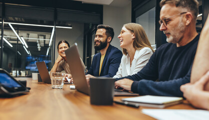 Positive businesspeople having a meeting in a boardroom