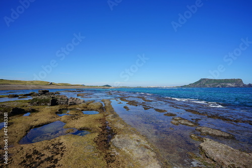 a shoaling beach with clear water