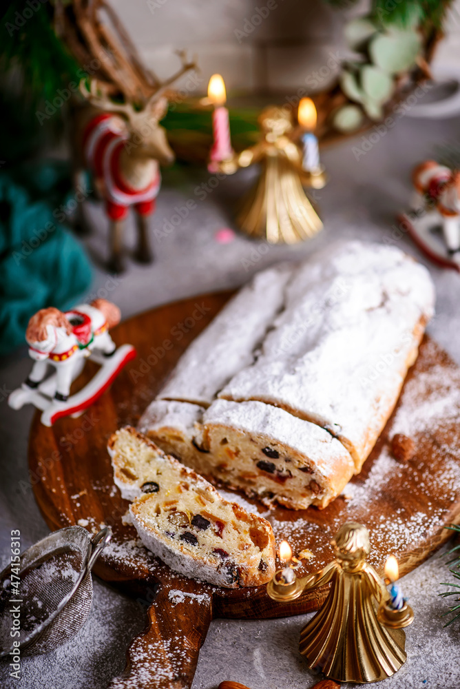 Christmas curd stollen on a Christmas rustic background Christmas curd stollen on a Christmas rustic background