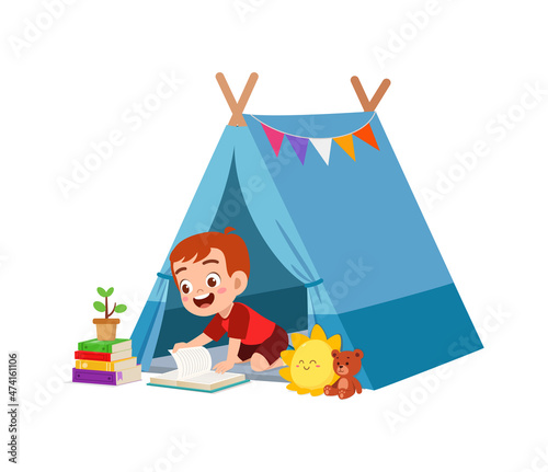 cute little boy play inside small tent