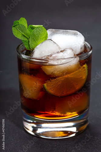 Rum with cola ice and mint popular alcoholic cocktail