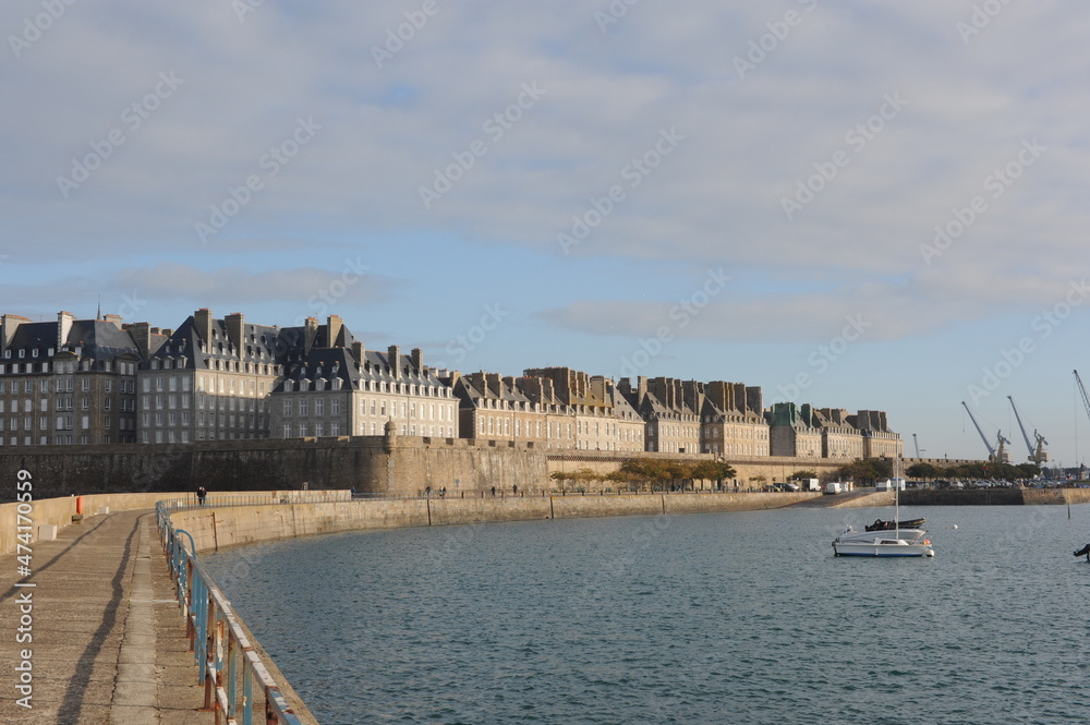 Walls and roofs and houses of Saint-Malo medieval historic fortress town in Brittany, France, panorama of the medieval city