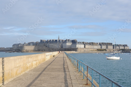 Walls and roofs and houses of Saint-Malo medieval historic fortress town in Brittany, France, panorama of the medieval city © piotrmilewski