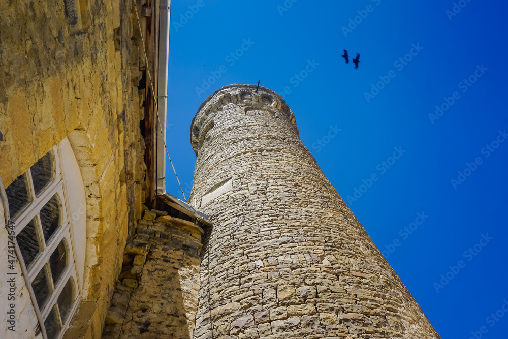 Ancient stone minaret of a mosque