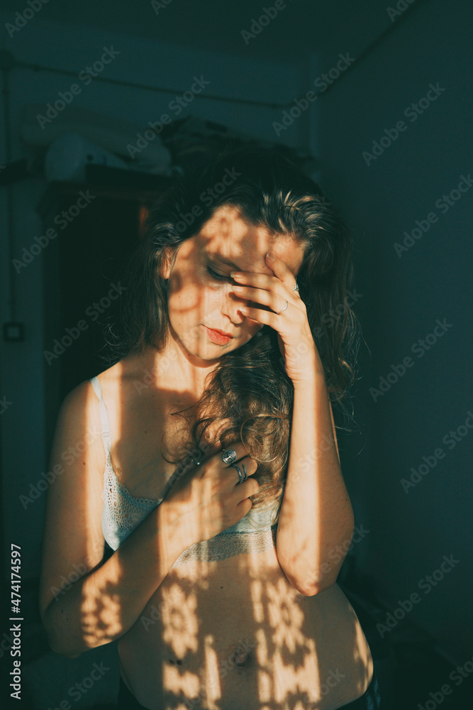 Artistic portrait of a young woman with retro shadow play style
