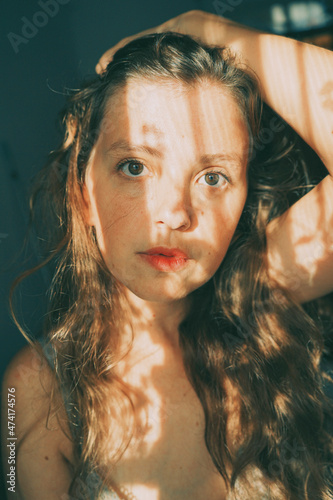 Artistic portrait of a young woman with retro shadow play style