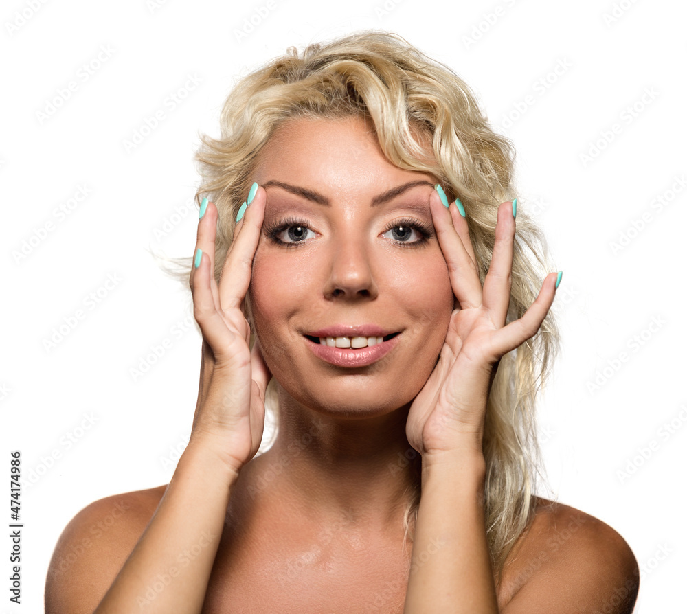 Fototapeta premium Young woman touching her face isolated on white background