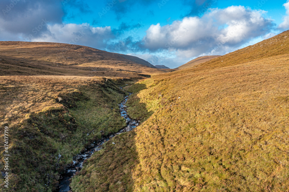 Beatiful stream flowing from the Mountains surrounding Glenveagh National Park - County Donegal, Ireland.