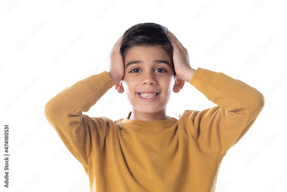 Astonished latin child with his hands on the head Astonished latin child with his hands on the head