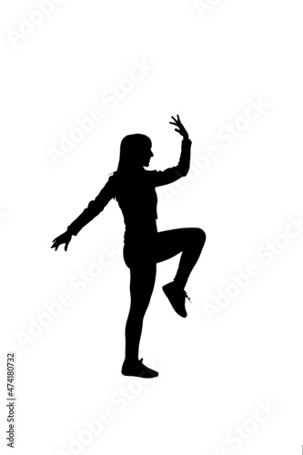 silhouette of girl doing warm-up gymnastic exercises