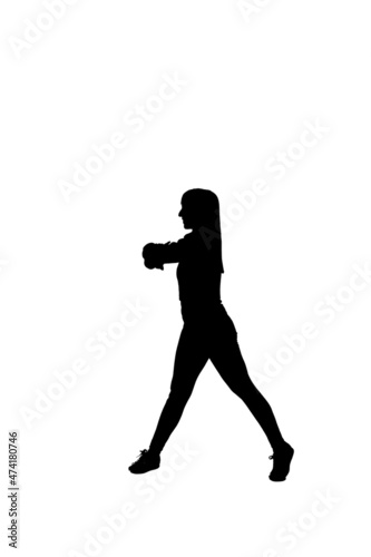 silhouette of girl doing warm-up gymnastic exercises