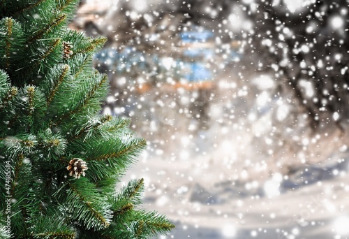 Decorated Christmas tree and snowy background