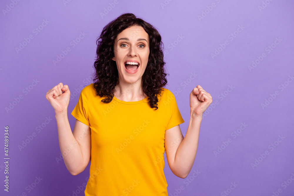 Photo of young excited lovely woman rejoice victory success sale isolated over violet color background Photo of young excited lovely woman rejoice victory success sale isolated over violet color background