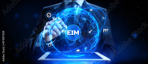 EIM Enterprise information management system. 3d render robot pressing virtual button. © Murrstock