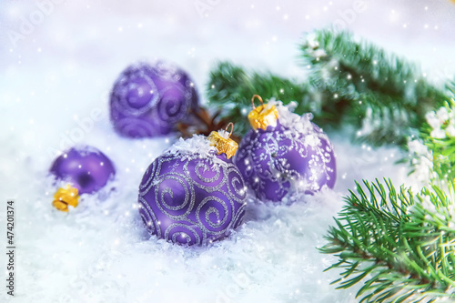 Christmas cards with snow and decor. very peri  Color of the year  2022  blue  purple  Selective focus.