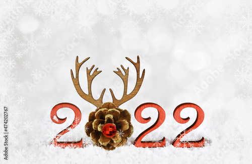 Red wooden numbers 2022 wit...