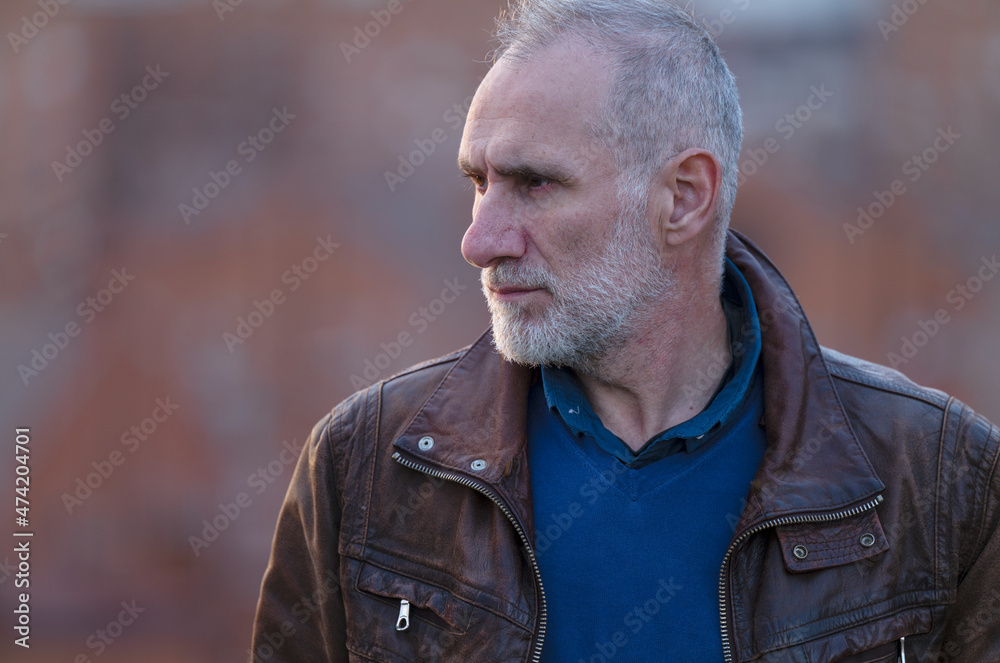 Portrait of adult man in brown leather jacket Portrait of adult man in brown leather jacket