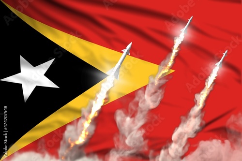 Modern strategic rocket forces concept on flag fabric background, Timor-Leste ballistic warhead attack - military industrial 3D illustration, nuke with flag photo