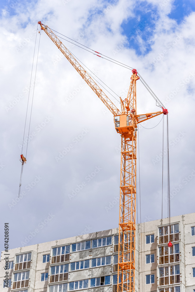 Construction crane on a building area backgroung