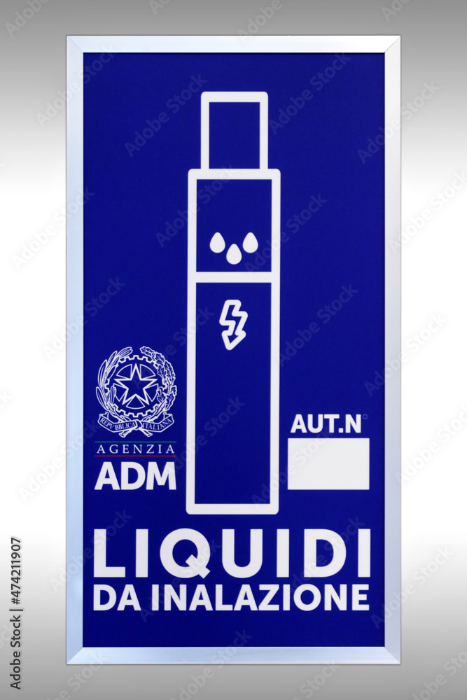 Obraz premium Signboard, illuminated sign of the state for the sale of products for electronic cigarettes, italy 