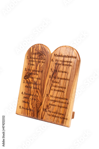 Obraz na plátne Two wooden tablets engraved with the Ten Commandments isolated on white background